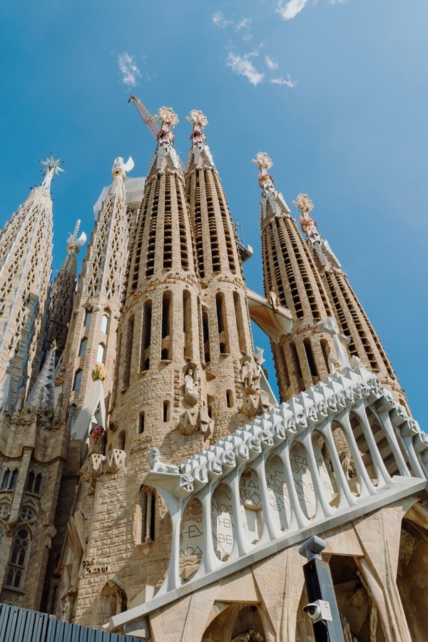 The Sagrada Família's towers against a blue sky in Barcelona