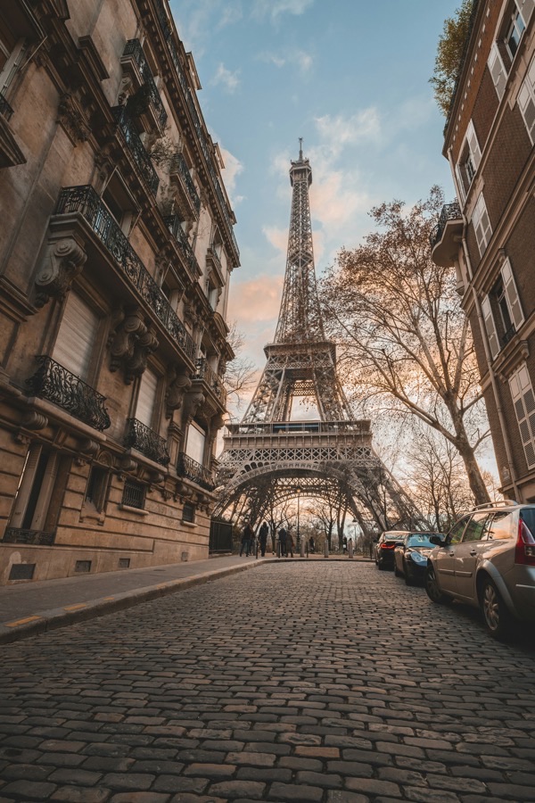 The Eiffel Tower seen from a Paris street